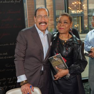 Man and woman posing happily