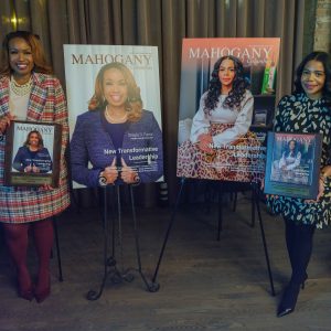 Women posing with awards together