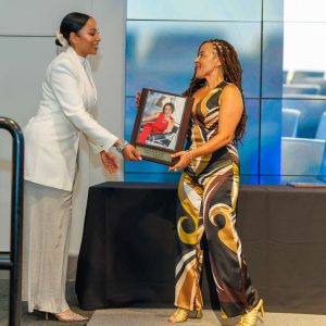 Woman accepting award